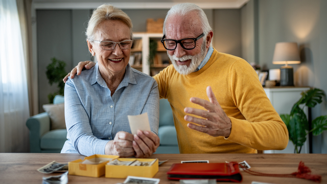Family preparing photo prints, slides, and albums for digitizing service