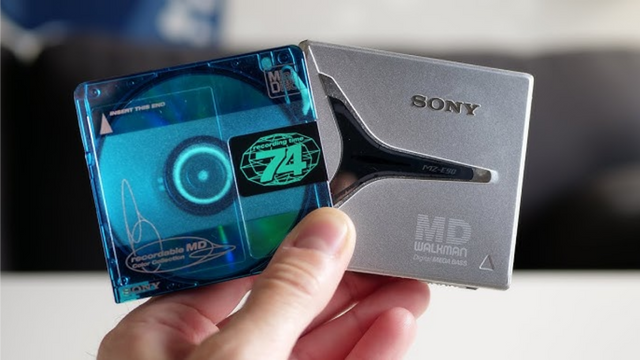 Sony MiniDisc player and colorful MiniDisc ready for digital conversion
