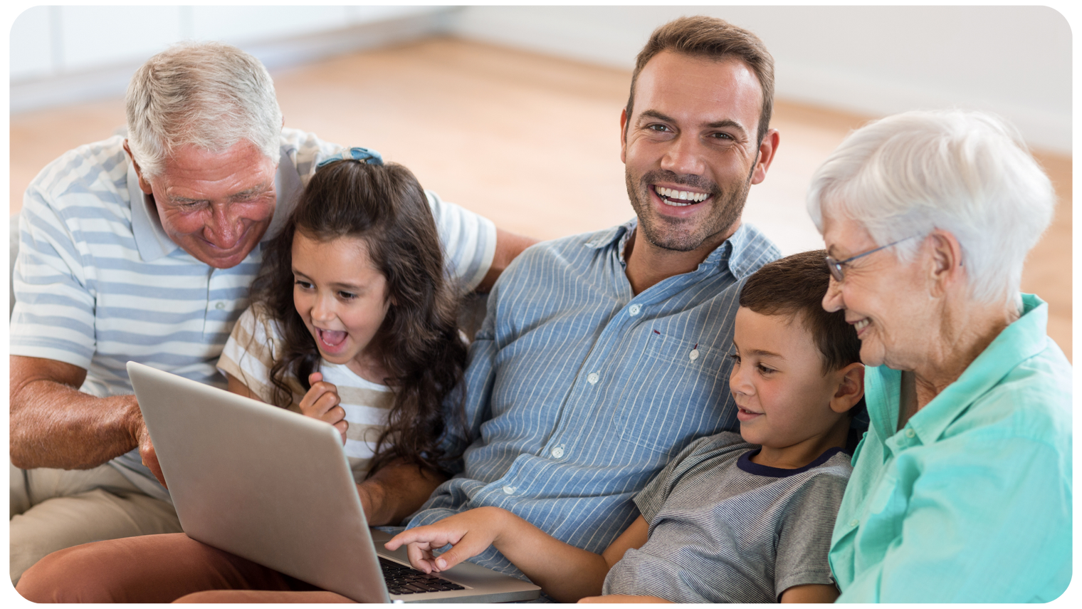 Family enjoying memories digitized from an Heirloom gift card