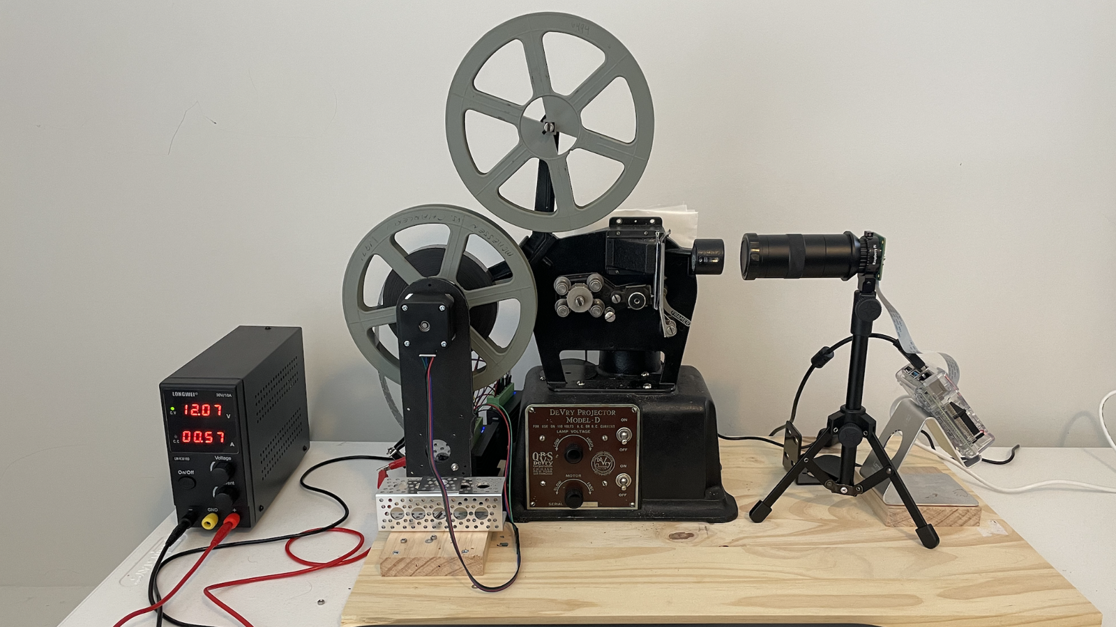 16mm film reel being converted to DVD for playback