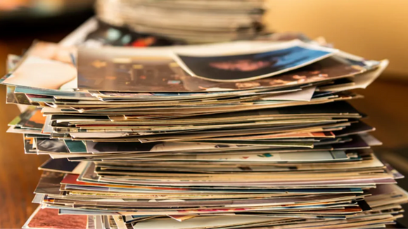 Pile of Printed Photos Before Digitizing