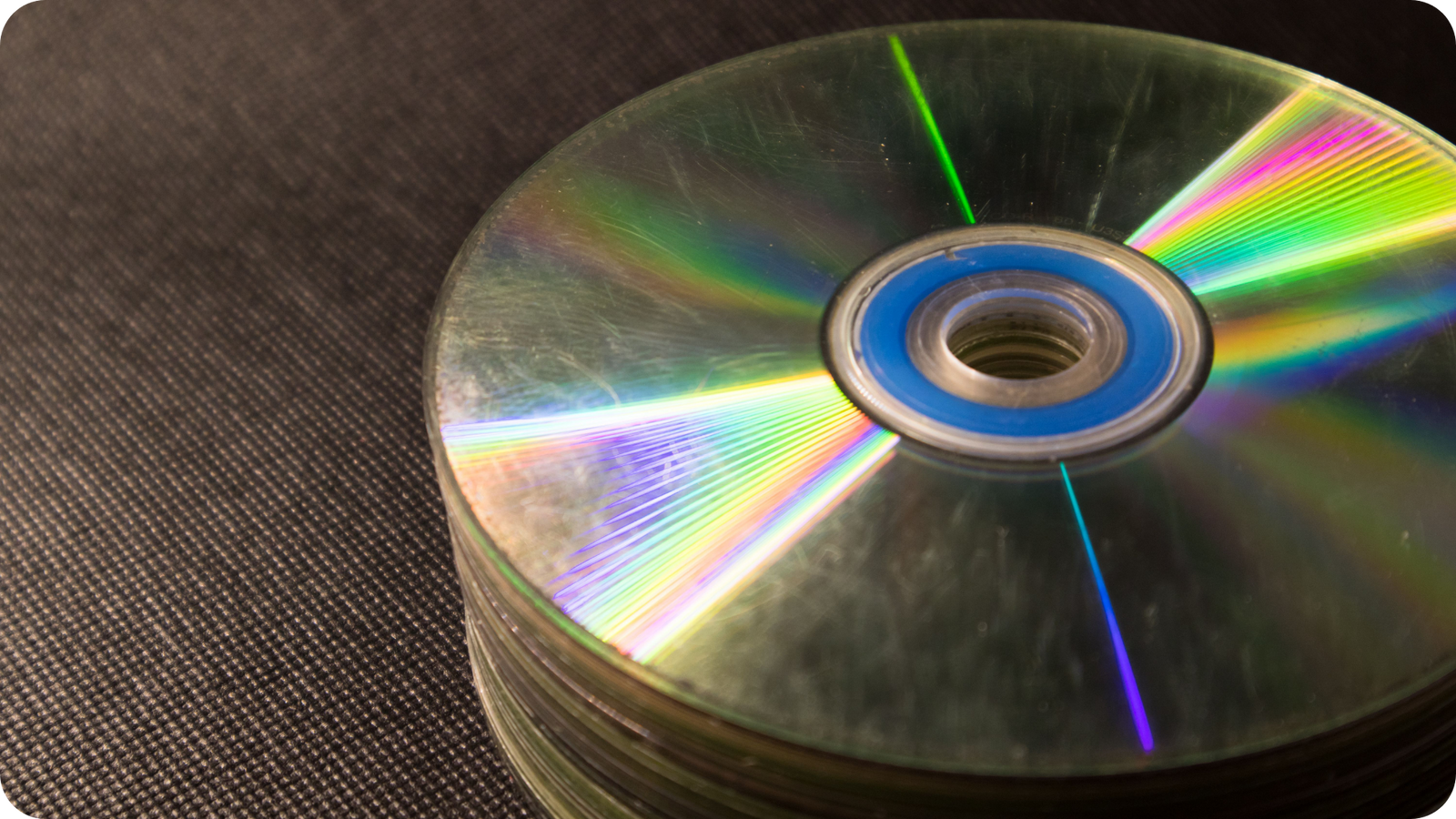 Stack of DVDs to be converted to digital