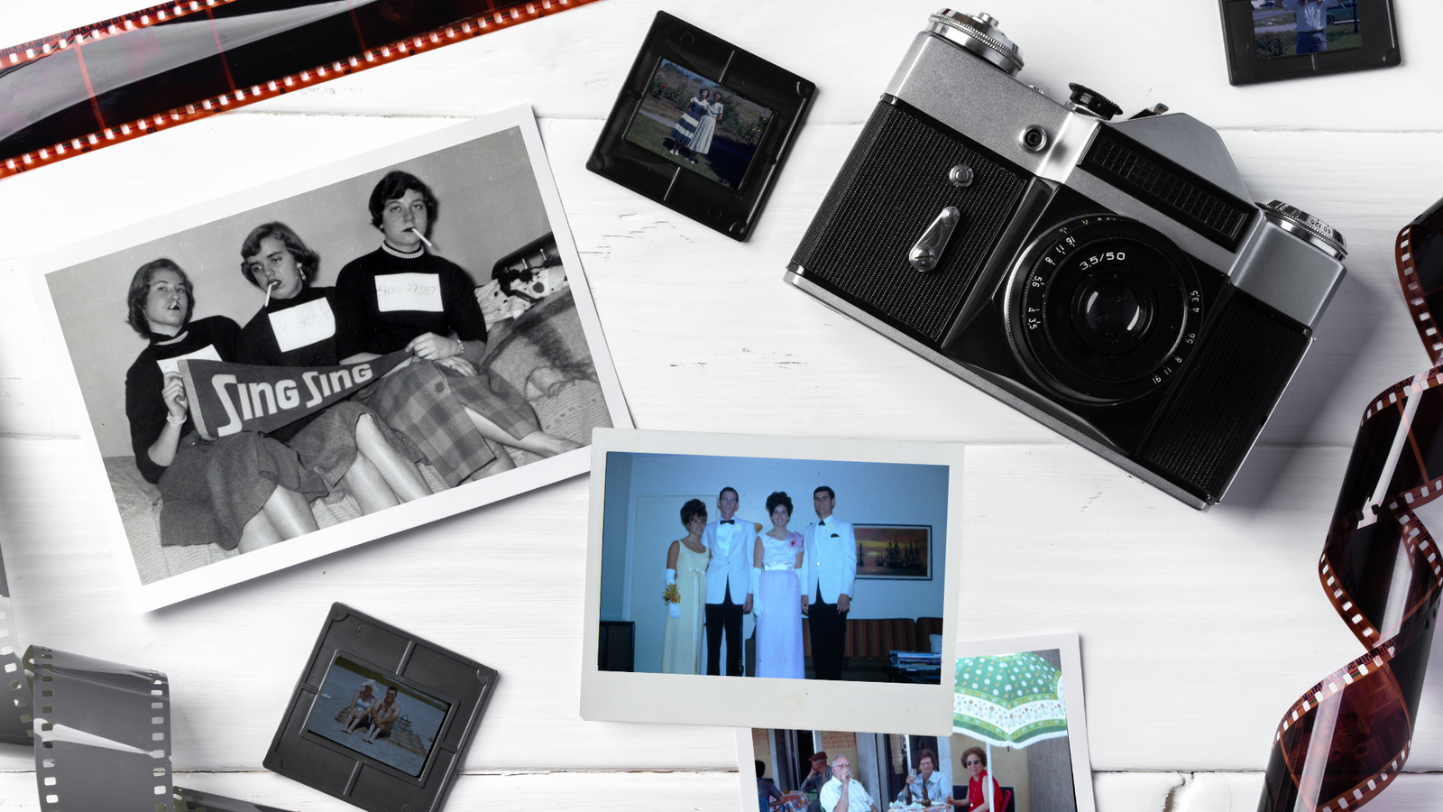 Camera with prints, negatives, and slides to digitize photos