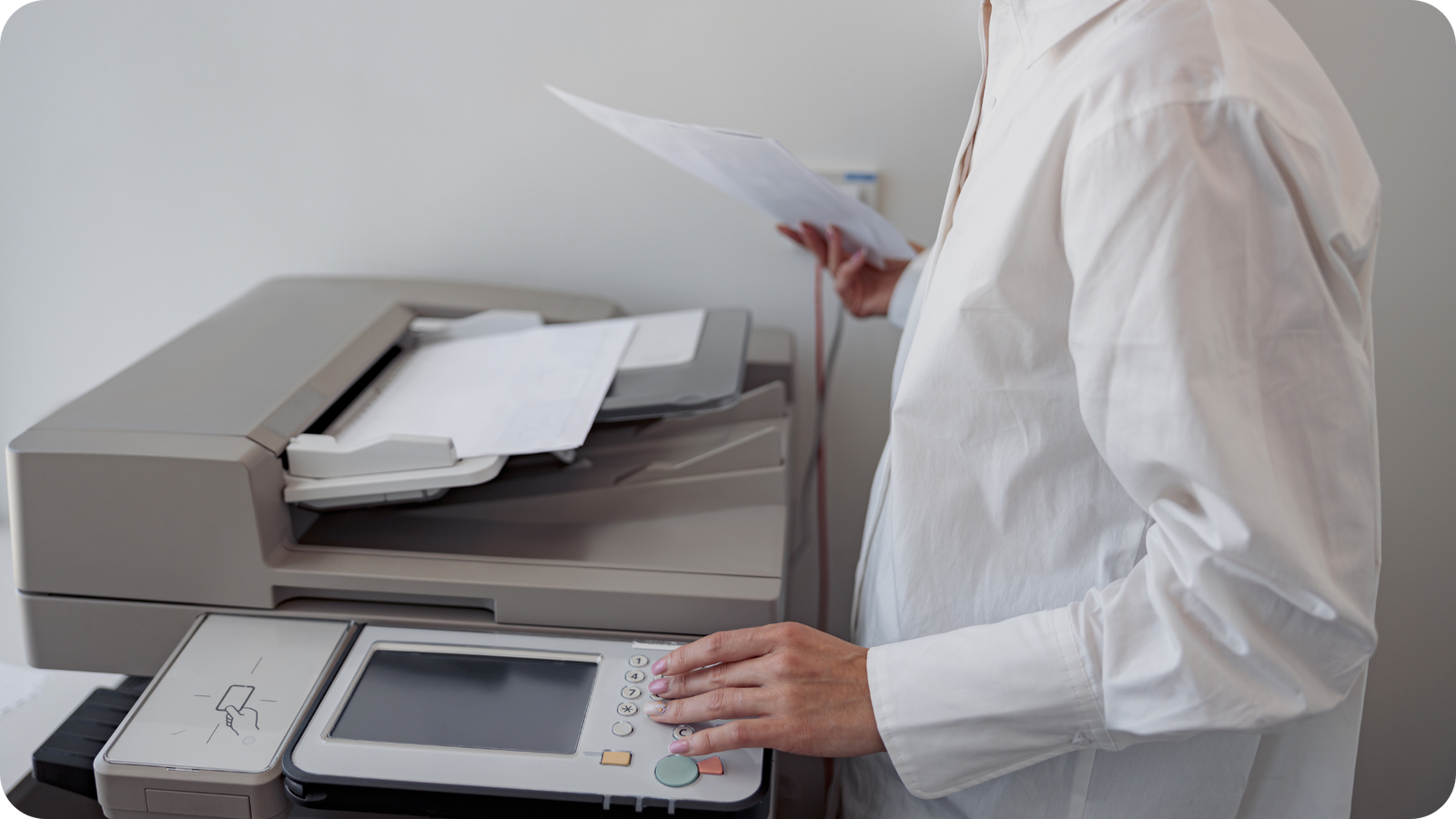 Paper documents being scanned into digital files