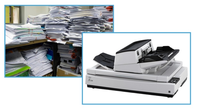 A large stack of papers being processed through a high-speed document scanner