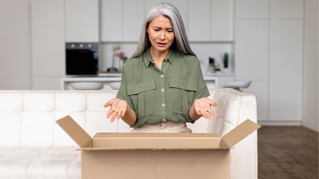 Frustrated woman reviewing Legacybox