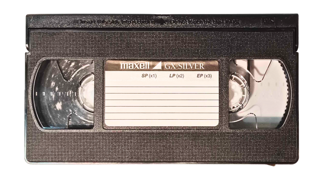 A worn-out VHS tape with residue from sticky shed syndrome