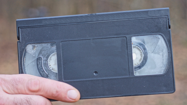 VHS Tape in Handing Before Turning Into Digital