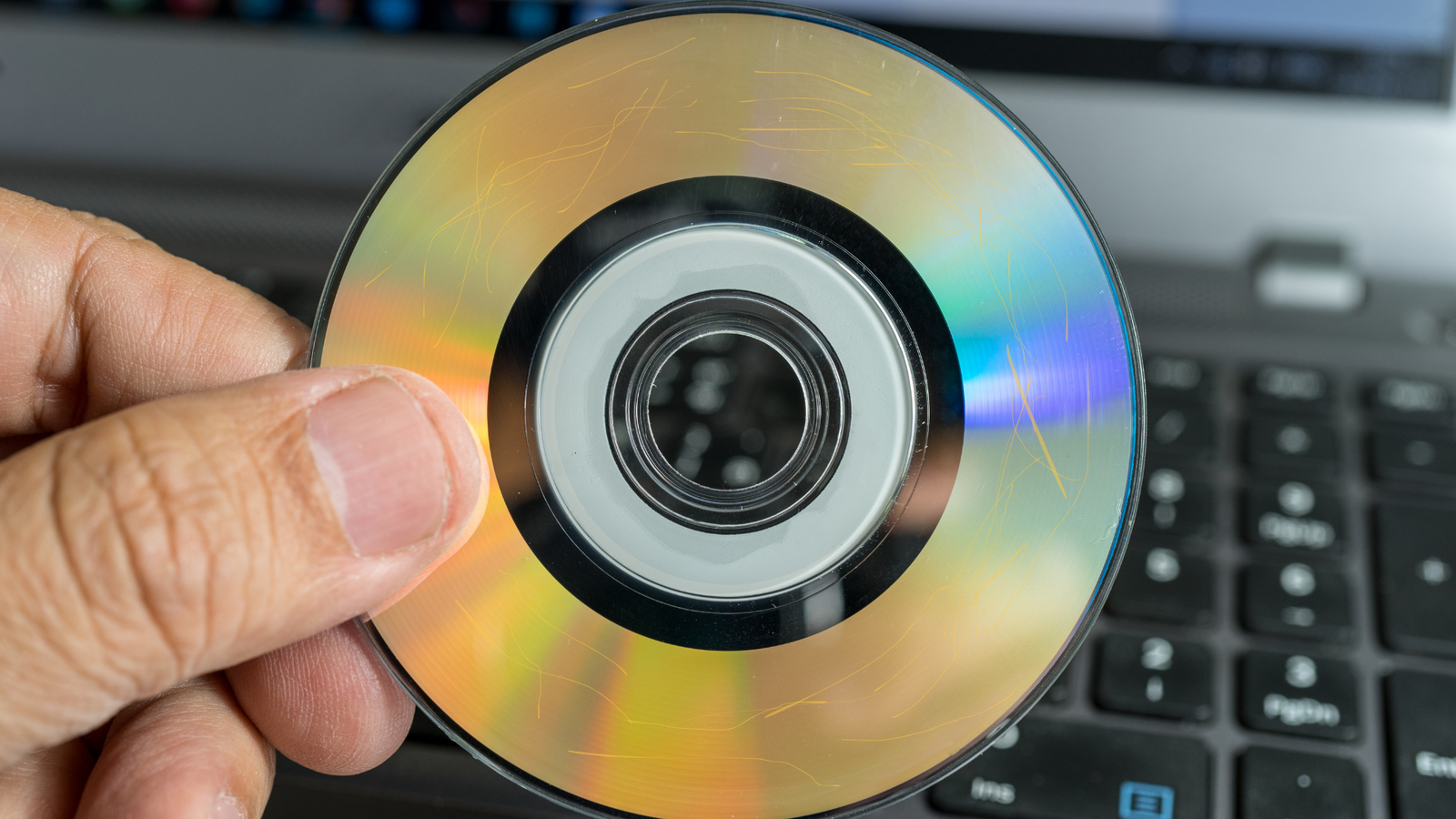 Mini DVD being converted into secure digital files for modern viewing
