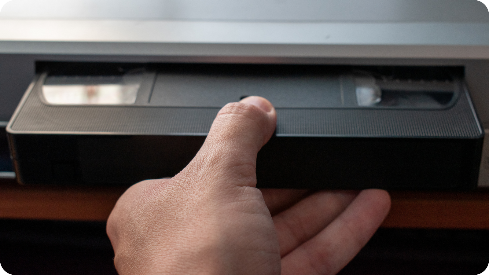 VCR player with VHS tape inserted