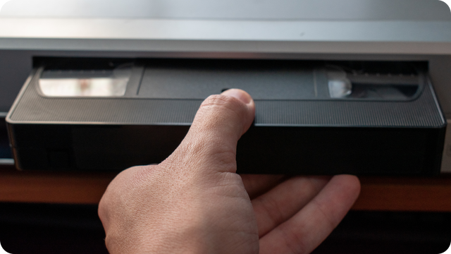 VCR player with VHS tape inserted