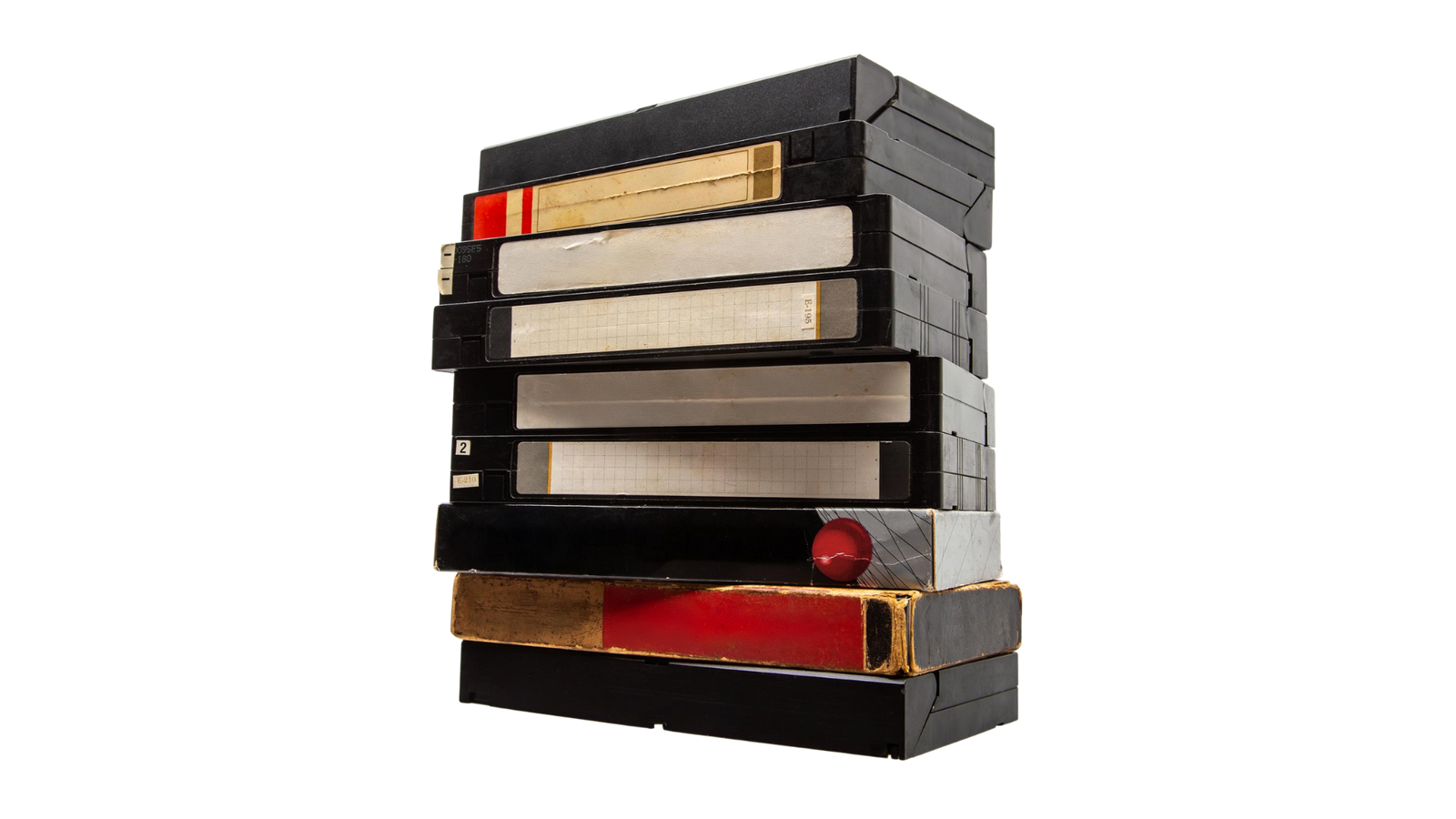 Stack of VCR tapes before digitization
