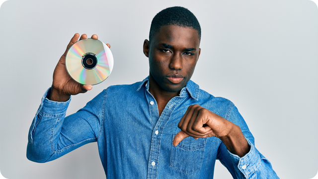 Man frustrated because DVDs were never meant to last forever.