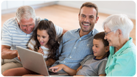 Family enjoying memories digitized from an Heirloom gift card