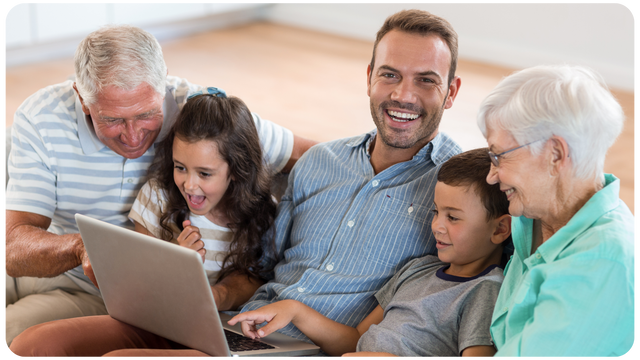 Family enjoying memories digitized from an Heirloom gift card